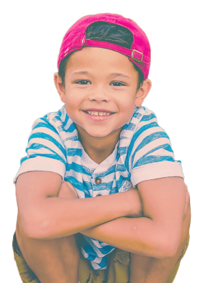 An image of a smiling child looking at the camera